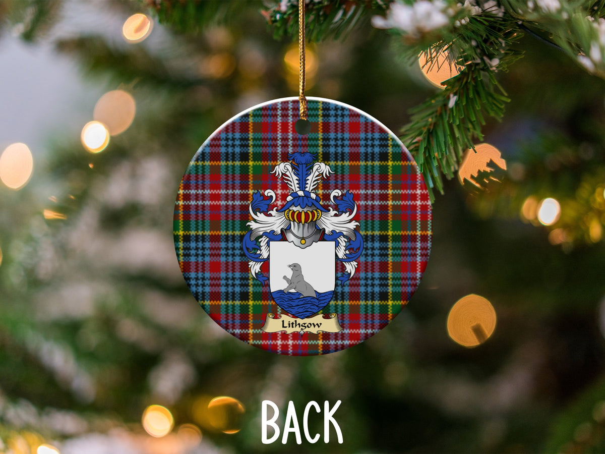Lithgow ceramic ornament detail showing a double-sided family shield on a Caledonia tartan background