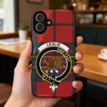 Leslie clan crest tartan phone case — edge-to-edge plaid design with Grip Fast griffin motto