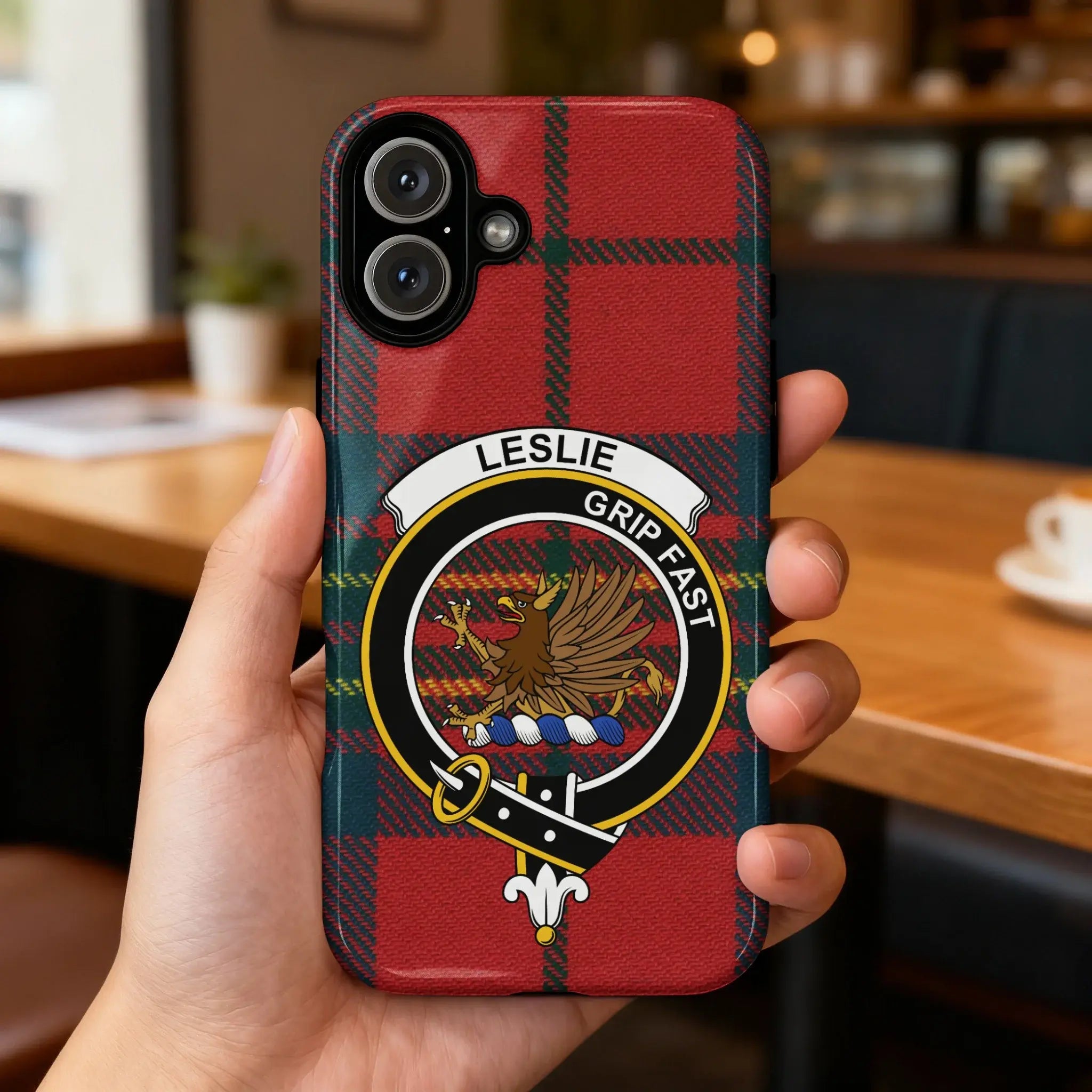 Leslie clan crest tartan phone case — edge-to-edge plaid design with Grip Fast griffin motto