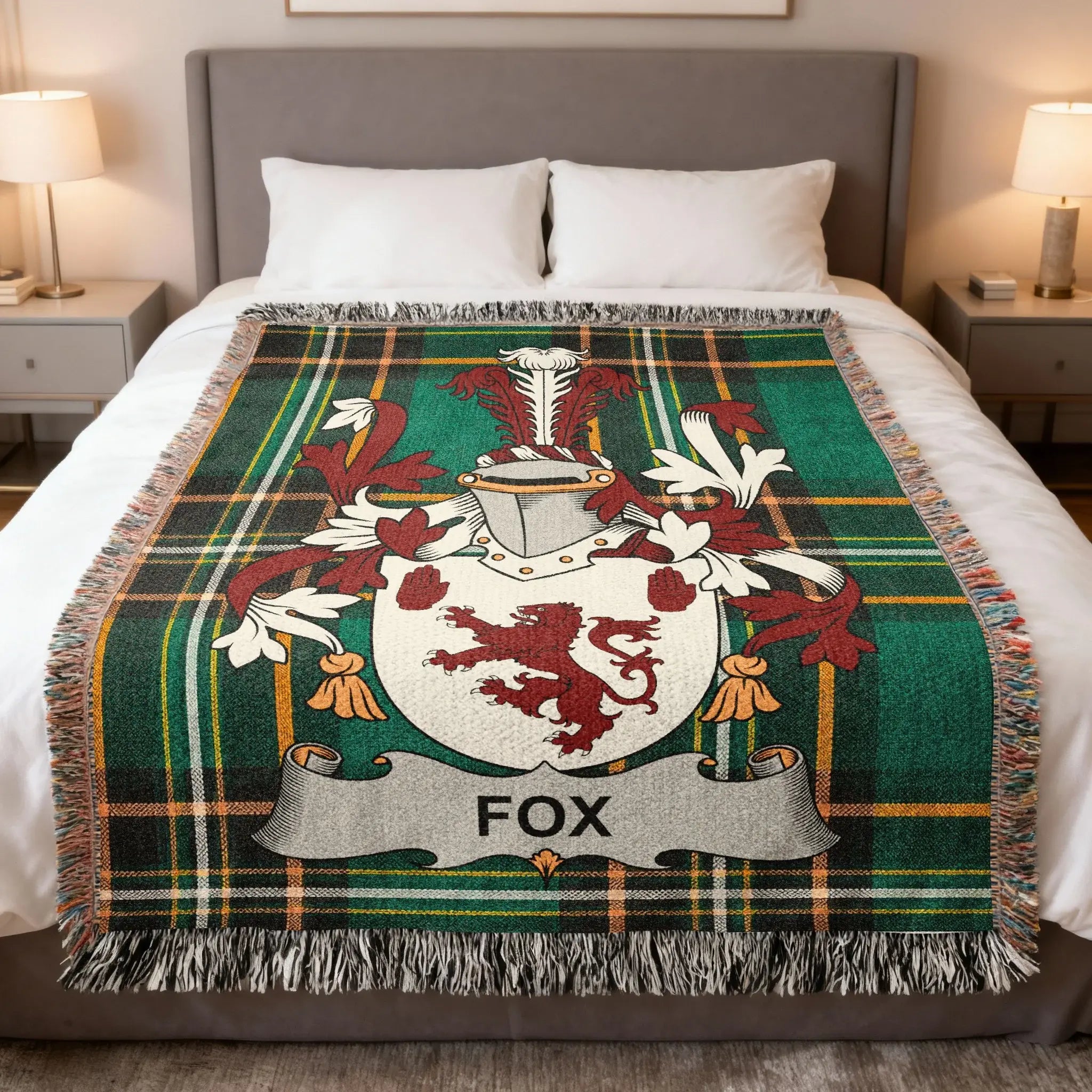 Green plaid blanket with the FOX family crest centered on it.