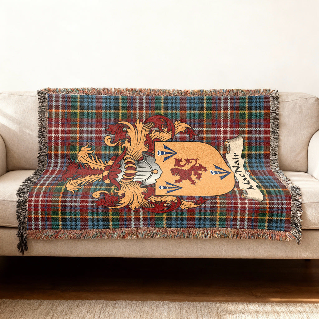 MacNair Scottish woven blanket with family shield and Caledonia tartan background