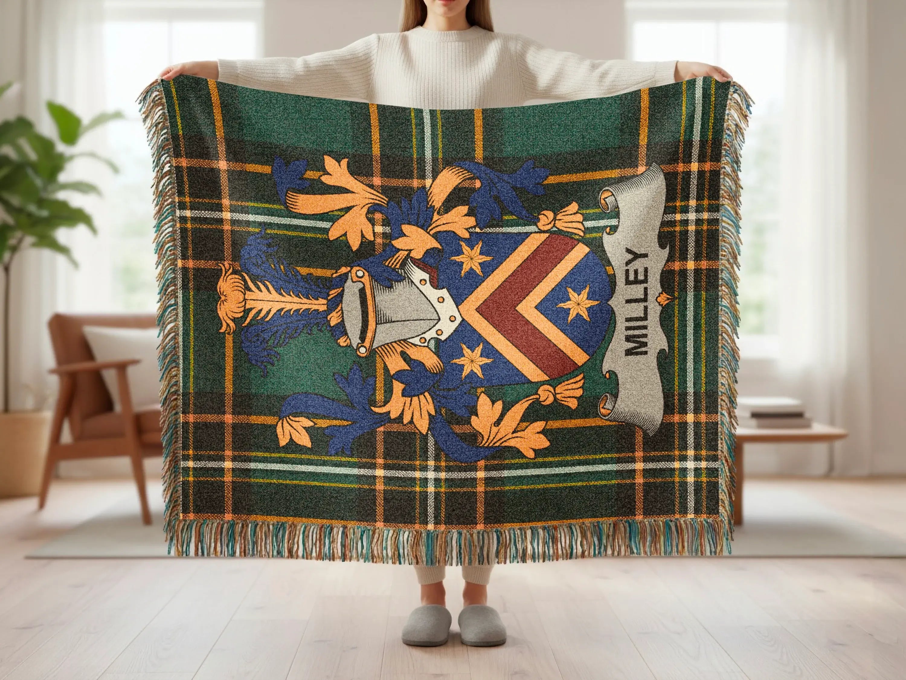 Tartan throw blanket with a blue and gold crest and "MILLEY" text.