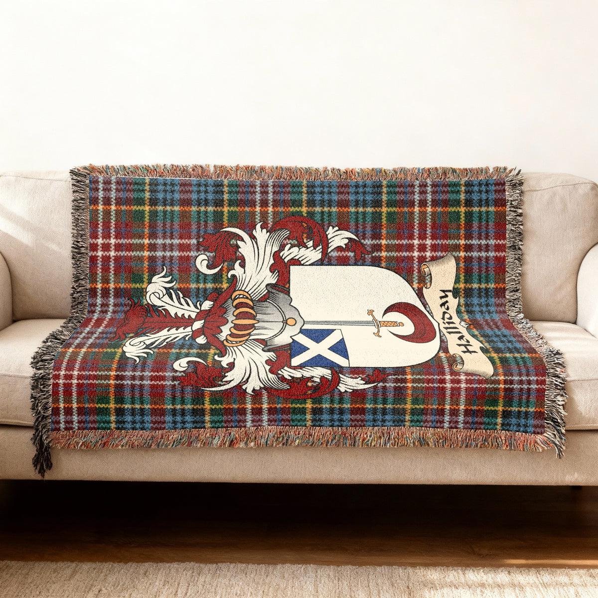 Halliday Scottish woven blanket with family shield and Caledonia tartan background