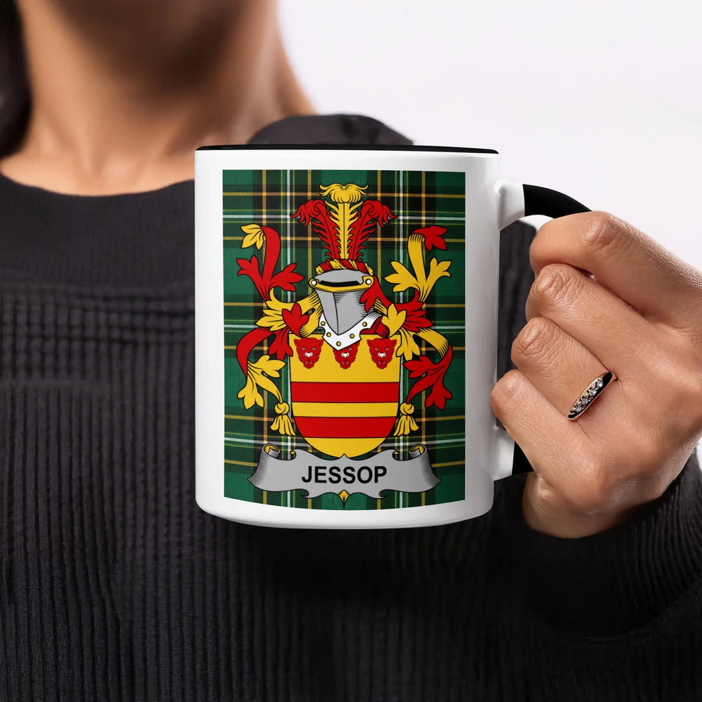 Jessop family crest on a white mug with black rim.