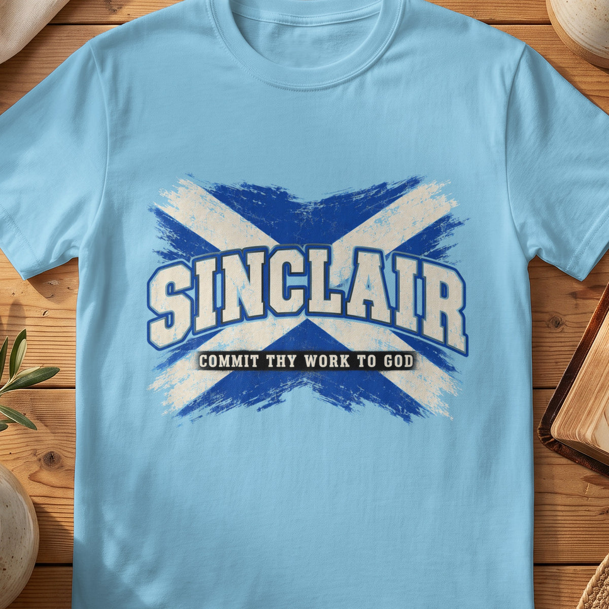 Sinclair Scottish Saltire T-shirt in Sky, with distressed blue and cream flag and “Commit Thy Work to God” lettering.