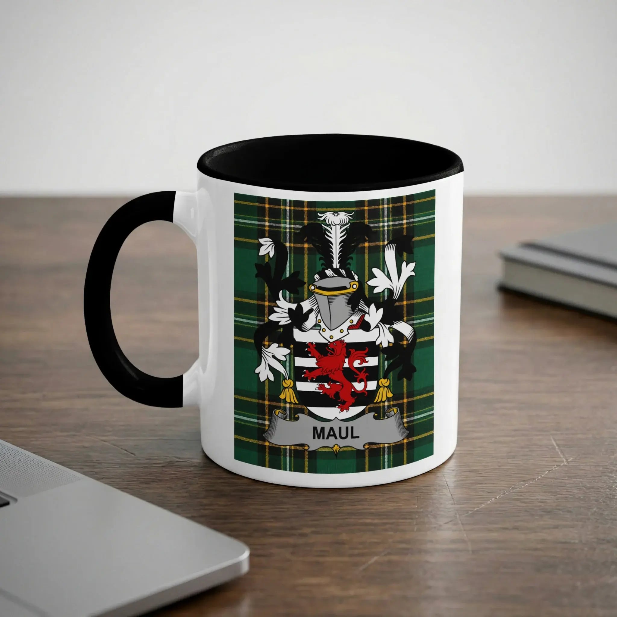 Mug with the Maul family crest on a checkered background.