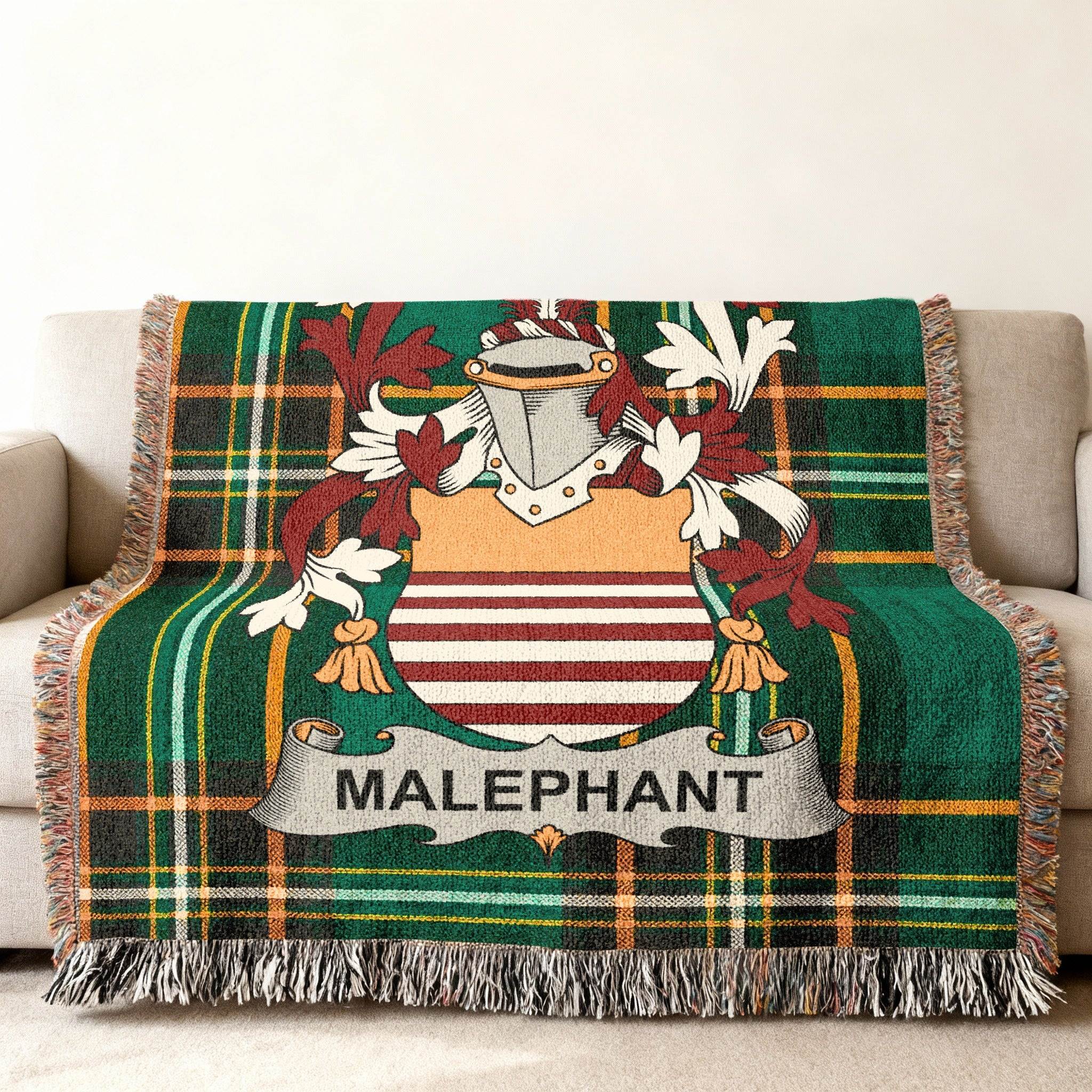 Tartan throw blanket with MalepHANT crest centered on green and red plaid.