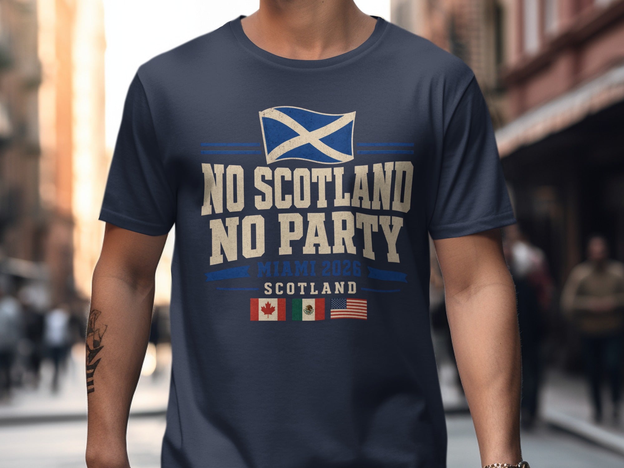 Navy t-shirt with "NO SCOTLAND NO PARTY MIAMI 2026 SCOTLAND" text and flags.
