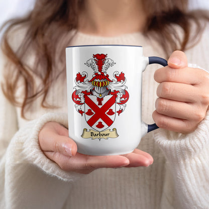 White mug with a coat of arms featuring a red cross and the name "Barbour".