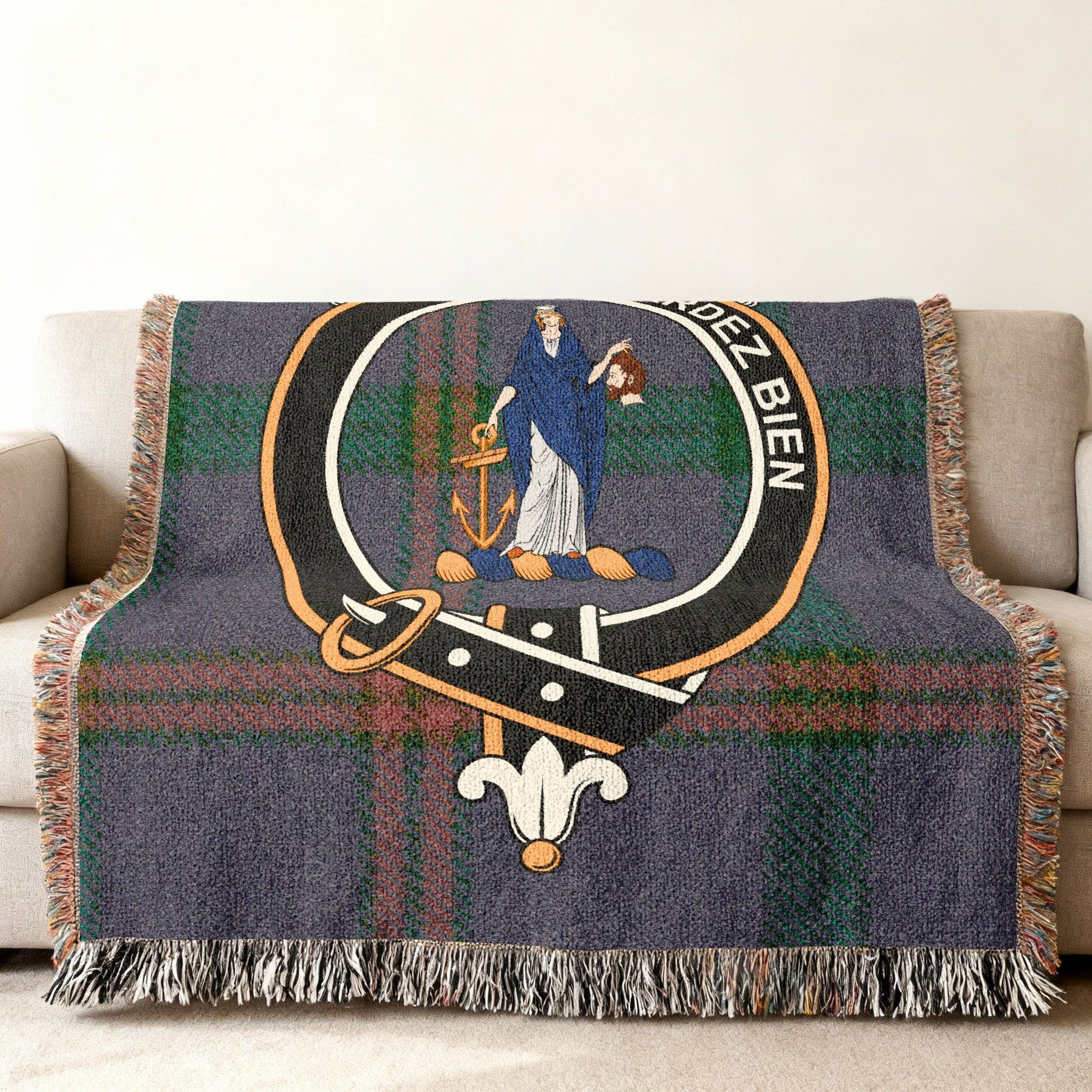 Montgomery clan Gardez Bien tartan woven blanket draped — Scottish clan crest on cotton throw