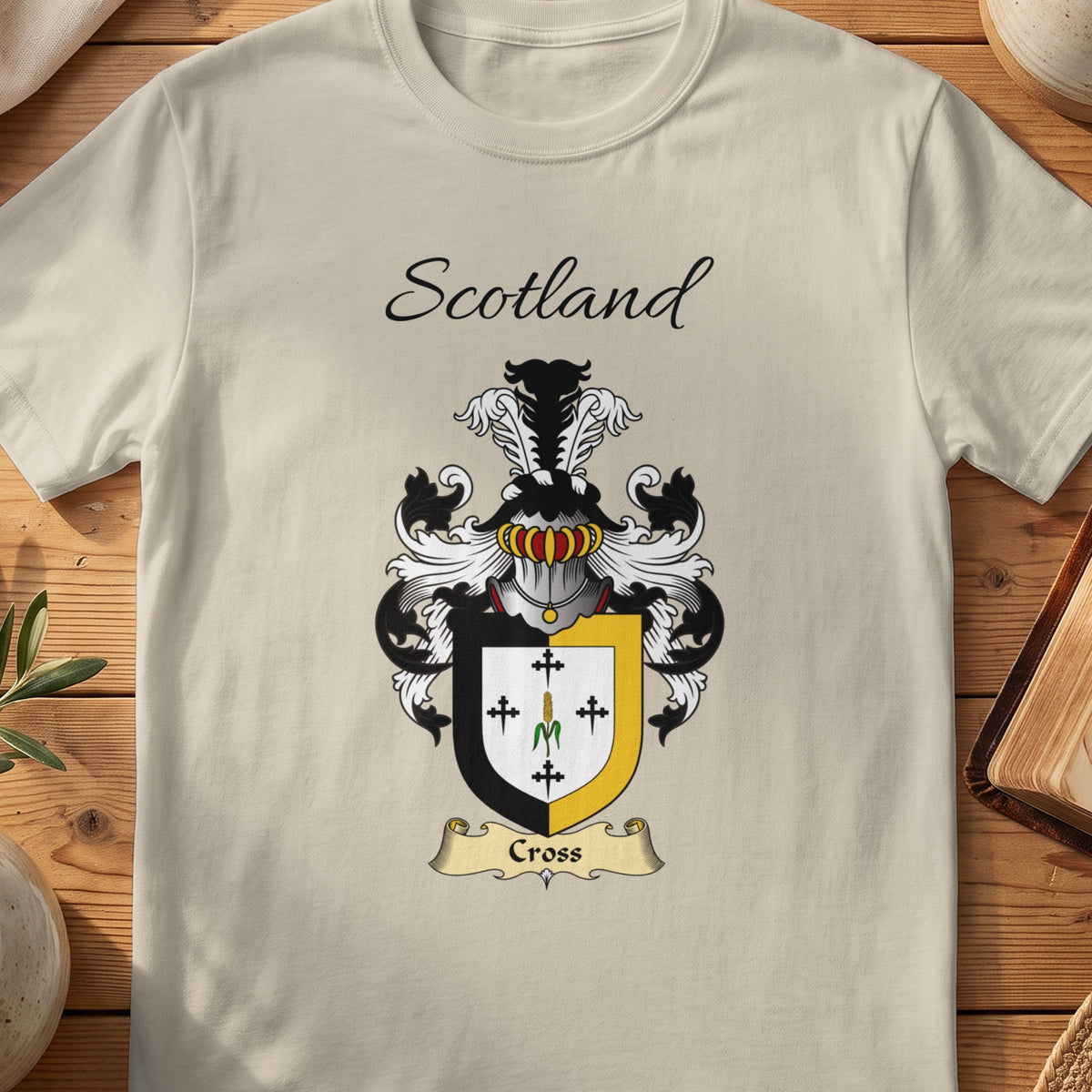 Sand Cross Scottish family shield T-shirt featuring small black crosses inside a gold border