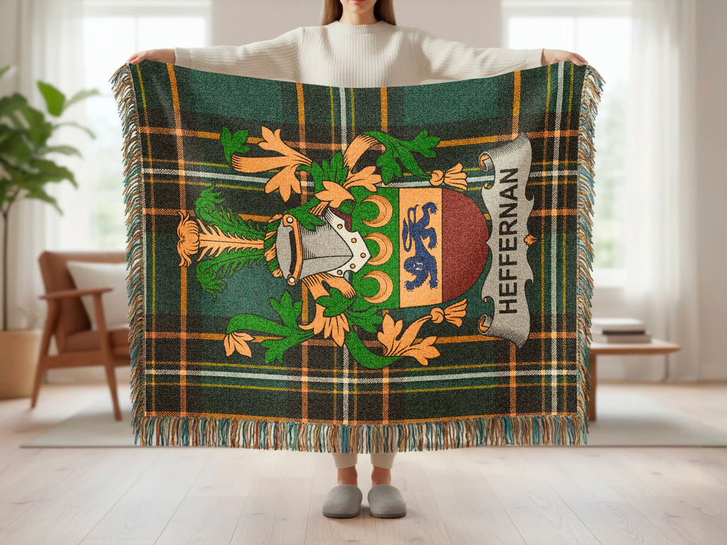 Plaid throw blanket with Scottish heraldry and the name "Heffernan."
