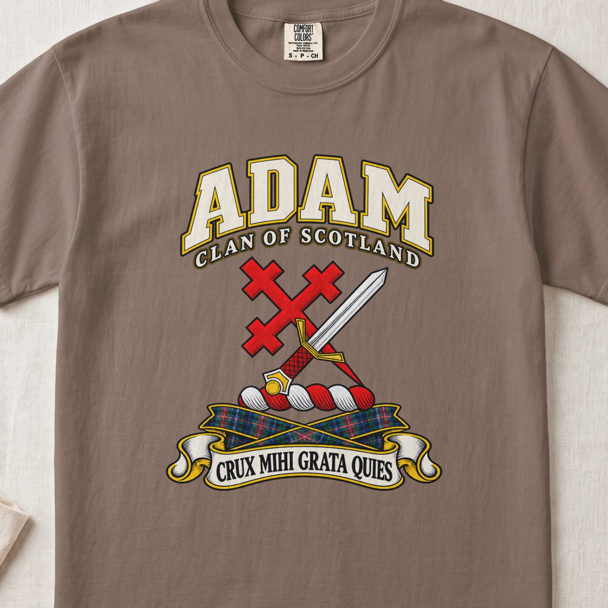 Adam Scottish clan T-shirt in Espresso, front view with a silver sword crossed with a red cross and motto banner.
