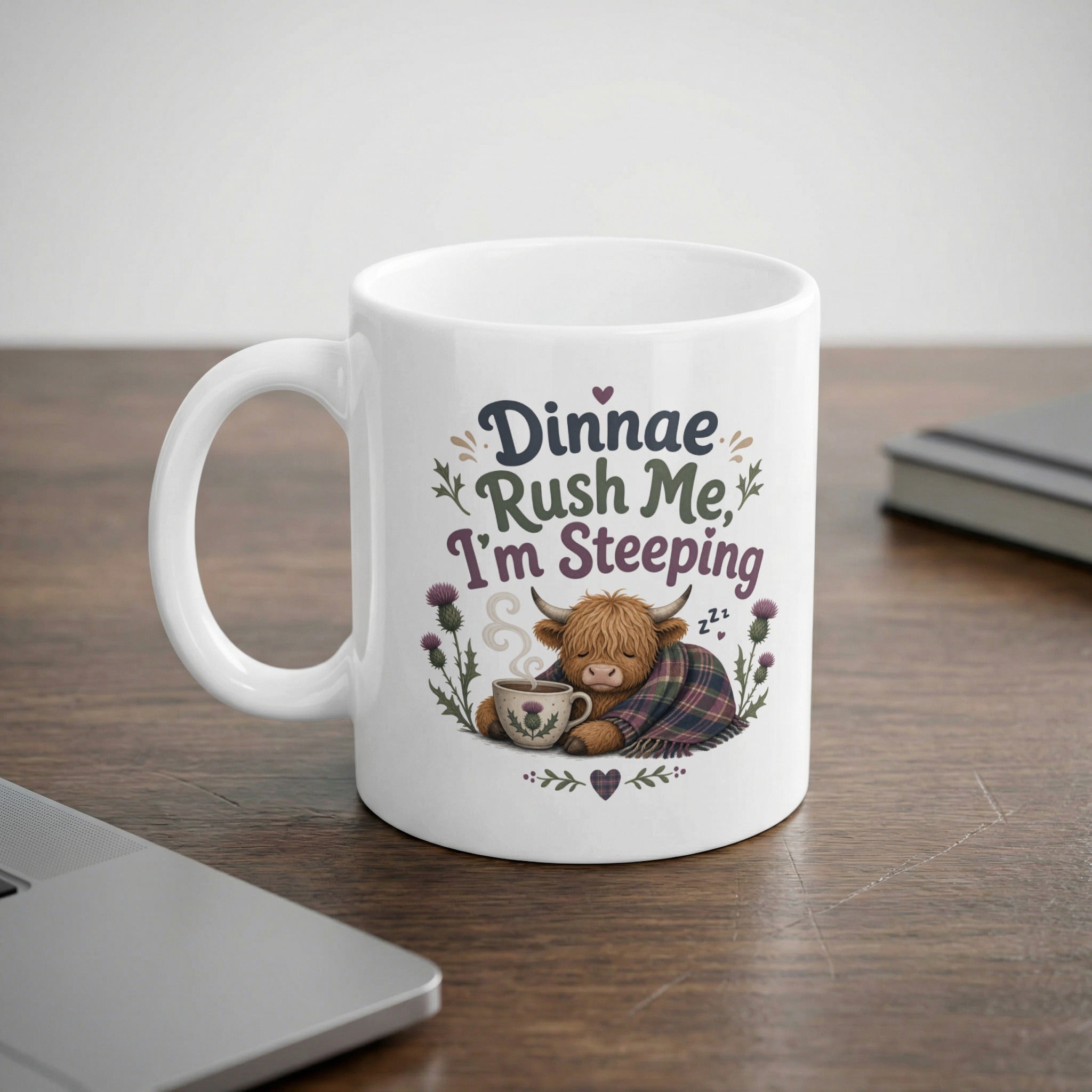White mug with highland cow illustration and text "Dinnae Rush Me, I'm Sleeping".