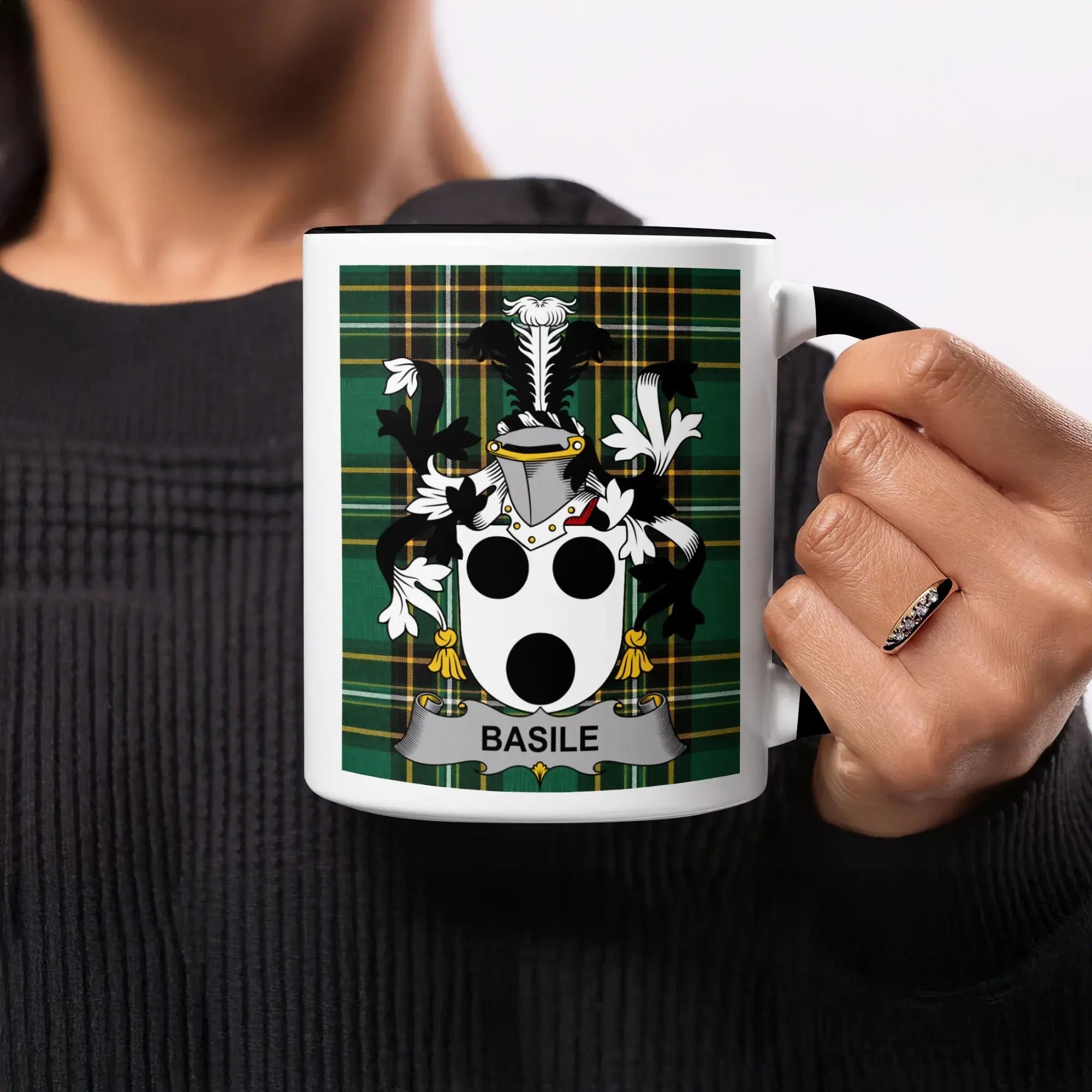 Mug with Basile family crest on green tartan background.