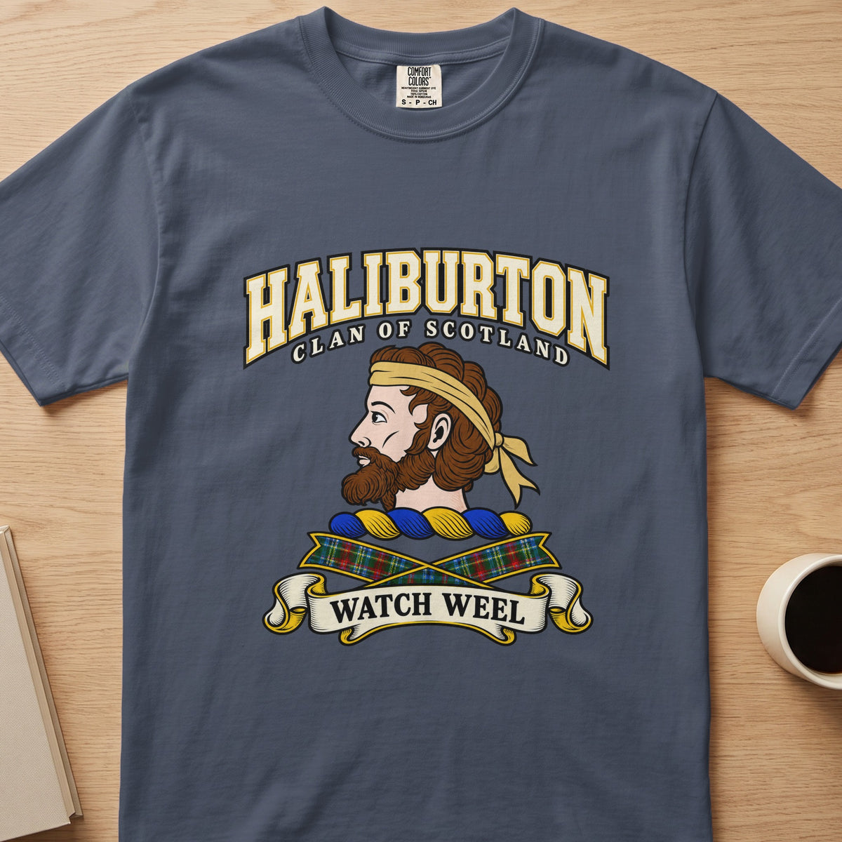Haliburton clan T-shirt in slate blue, front view with bearded head with a gold headband