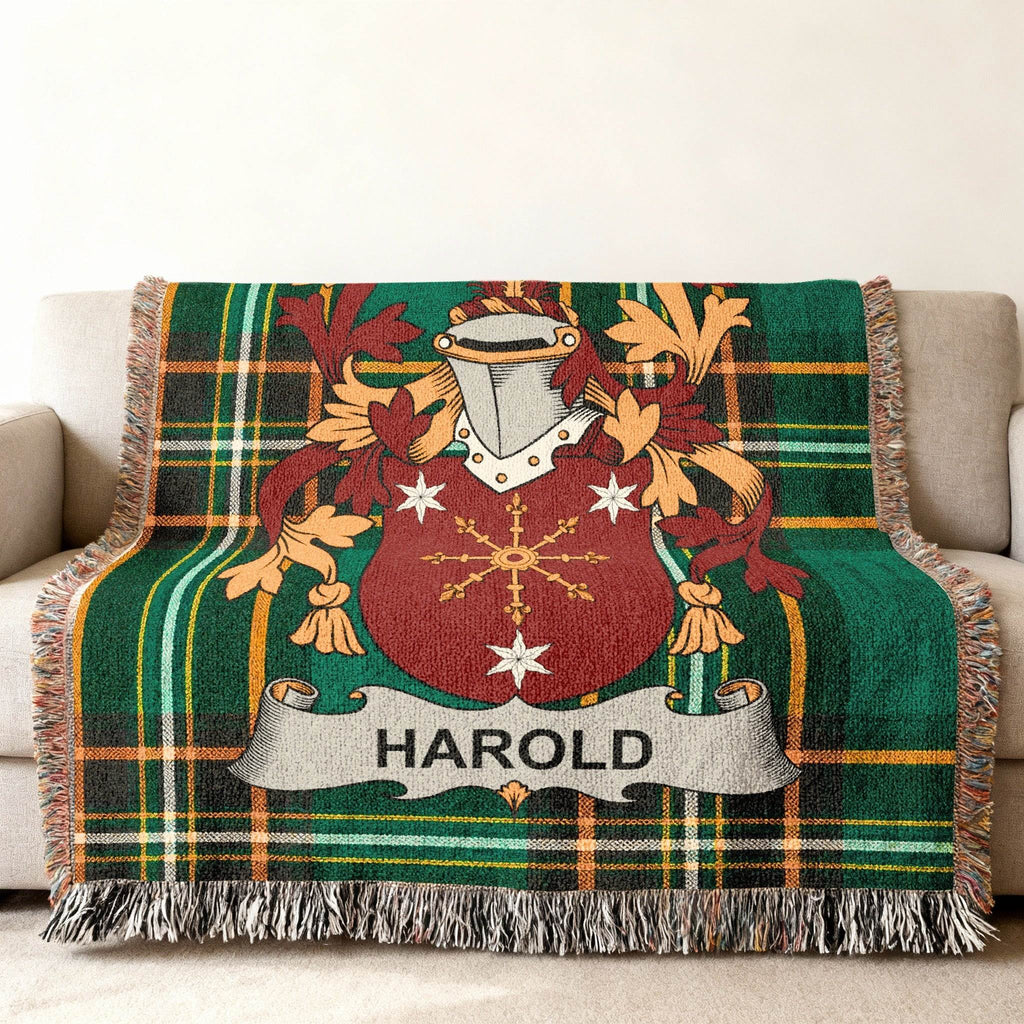 Woven plaid blanket featuring a family crest with the name HAROLD.