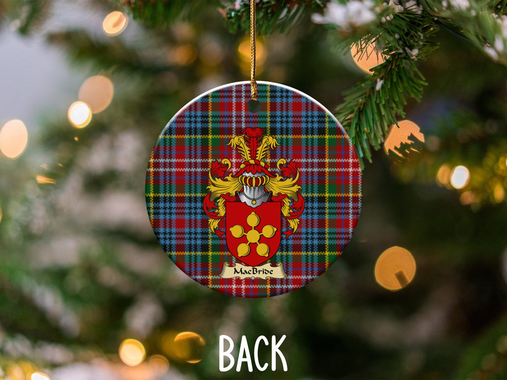 MacBride ceramic ornament detail showing a double-sided family shield on a Caledonia tartan background