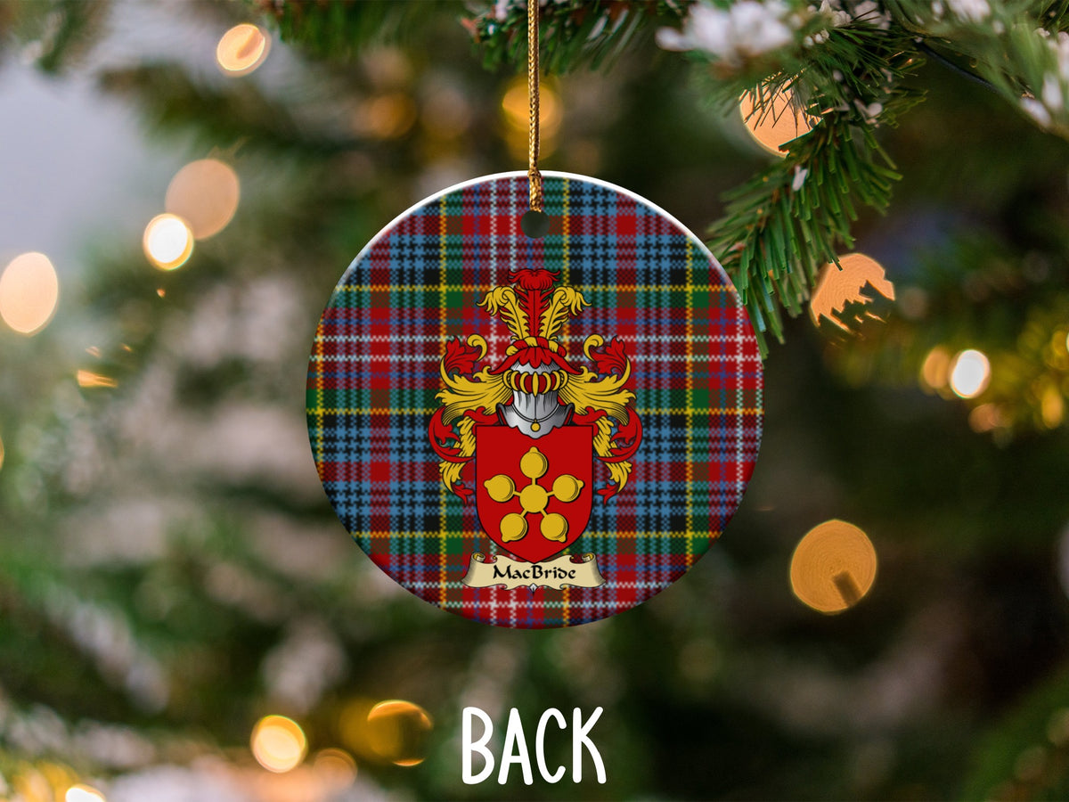 MacBride ceramic ornament detail showing a double-sided family shield on a Caledonia tartan background