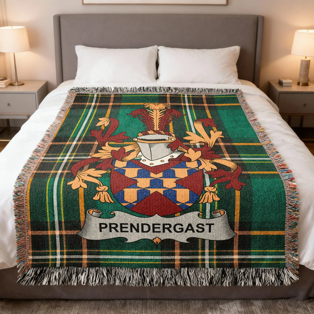 Green plaid blanket with Prendergast family crest draped on a bed.
