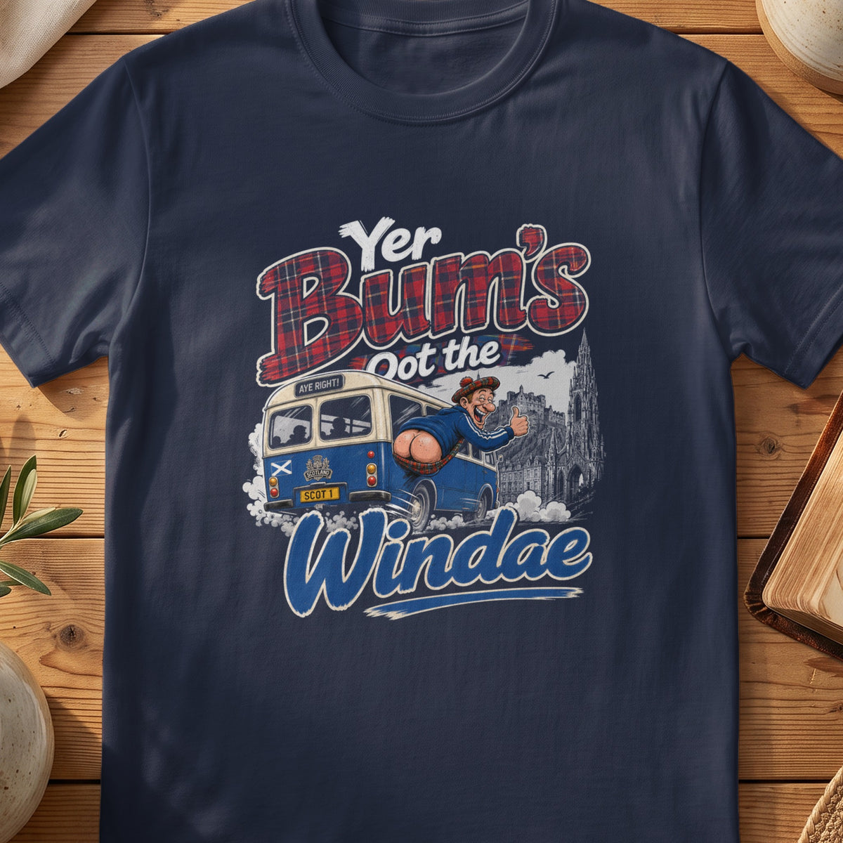 Navy Gildan 64000 unisex T-shirt flatlay with Yer Bum's Oot the Windae Scottish graphic design