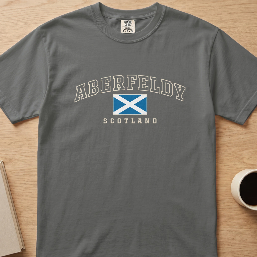 Pepper gray Aberfeldy Scotland Comfort Colors T-shirt laid flat with the blue-and-white Saltire