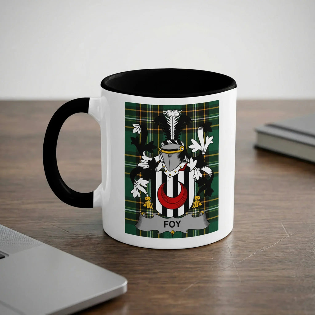 White mug with black rim and handle featuring a family crest with the name "Foy".