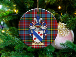Biggar Scottish clan ceramic ornament with family crest on a Caledonia tartan background, hanging on a Christmas tree