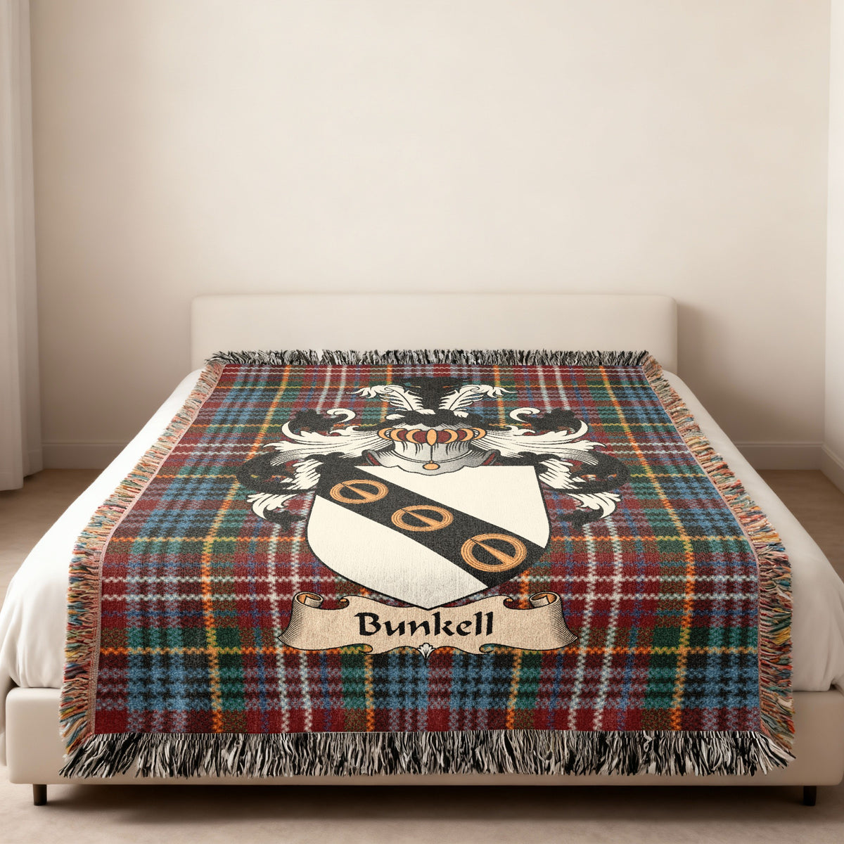 Bunkell Scottish woven blanket with family shield and Caledonia tartan background