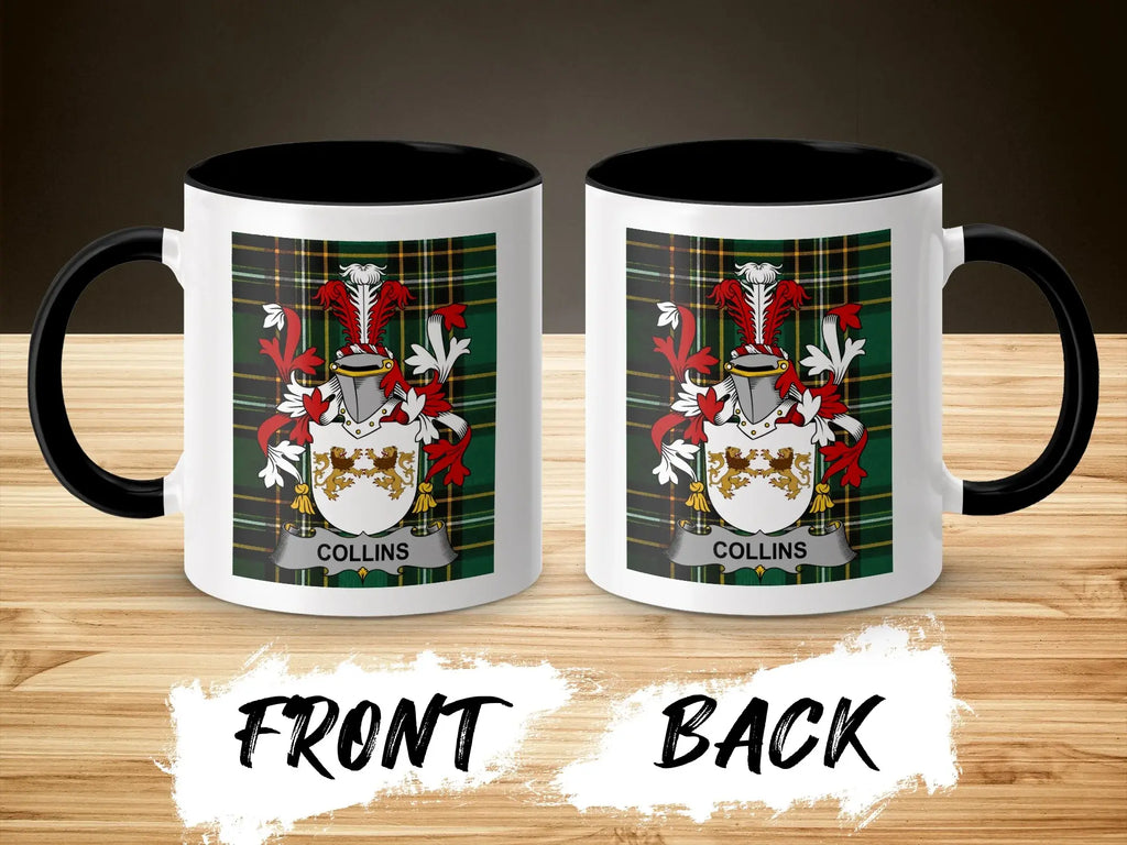 Two white mugs with black handles displaying the Collins family crest on a wooden surface.