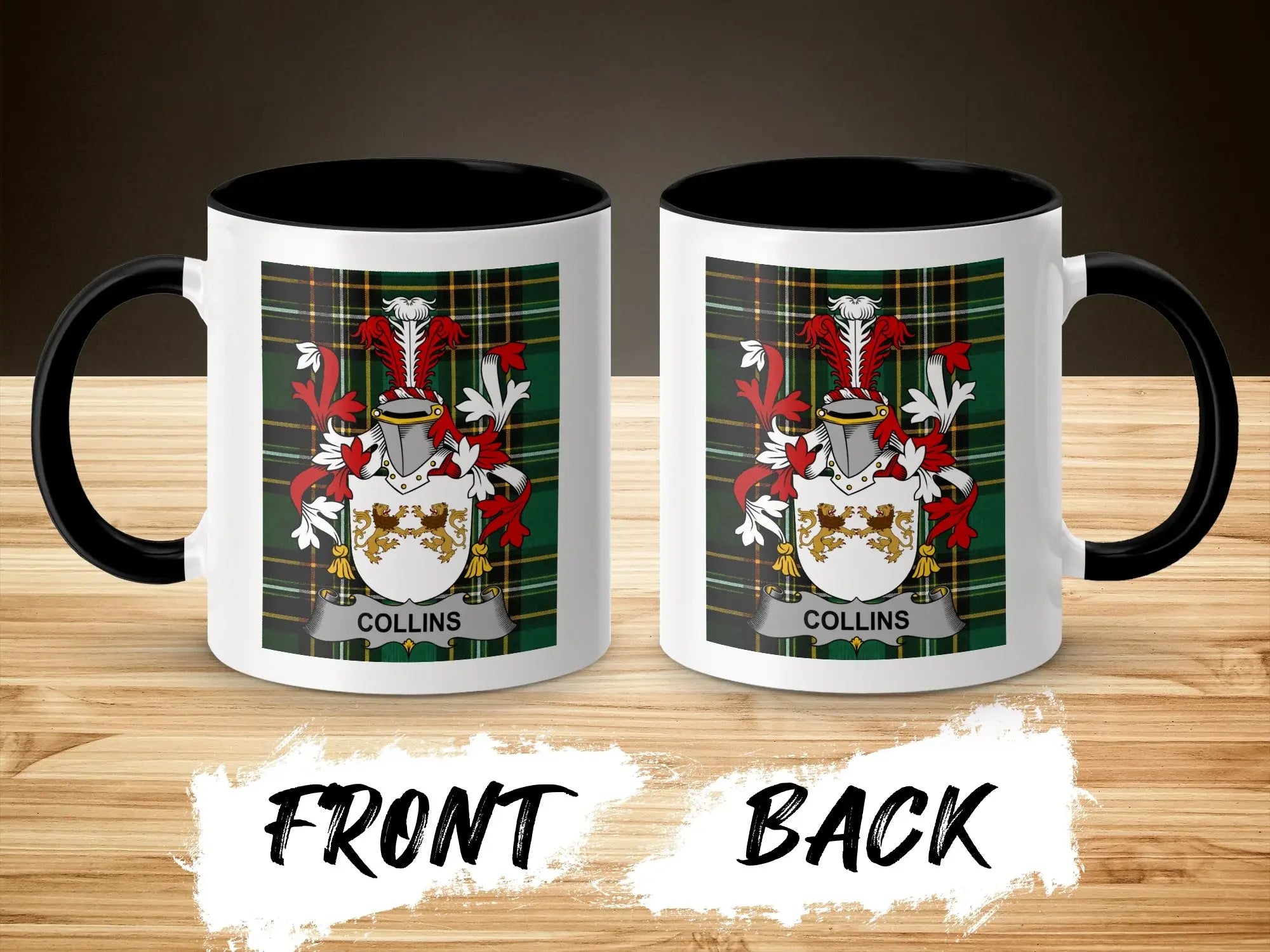 Two white mugs with black handles displaying the Collins family crest on a wooden surface.