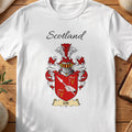 White Gib Scottish family shield T-shirt featuring a hand holding a diagonal spear on red