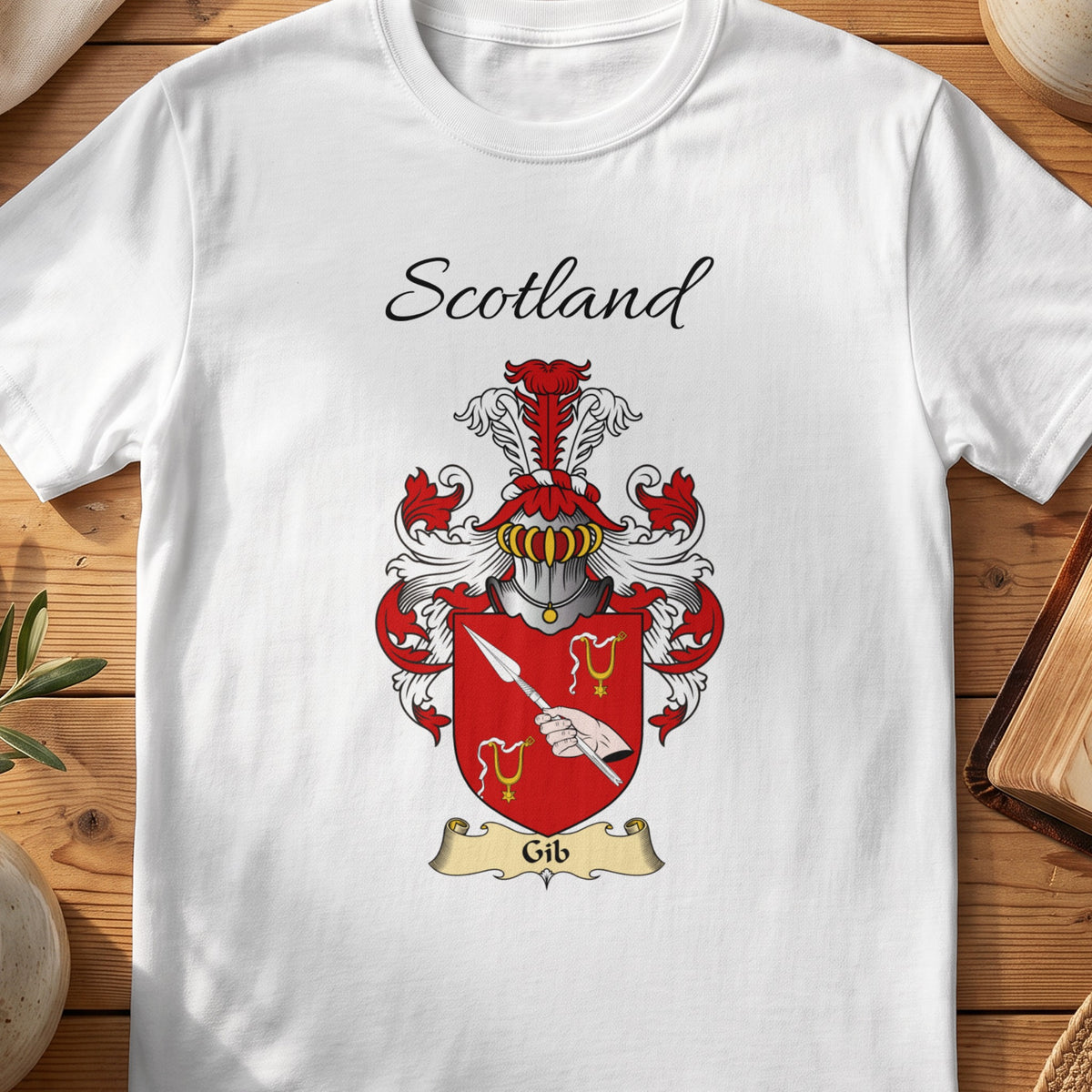 White Gib Scottish family shield T-shirt featuring a hand holding a diagonal spear on red