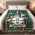 Green tartan blanket with Hammond family crest and name banner.