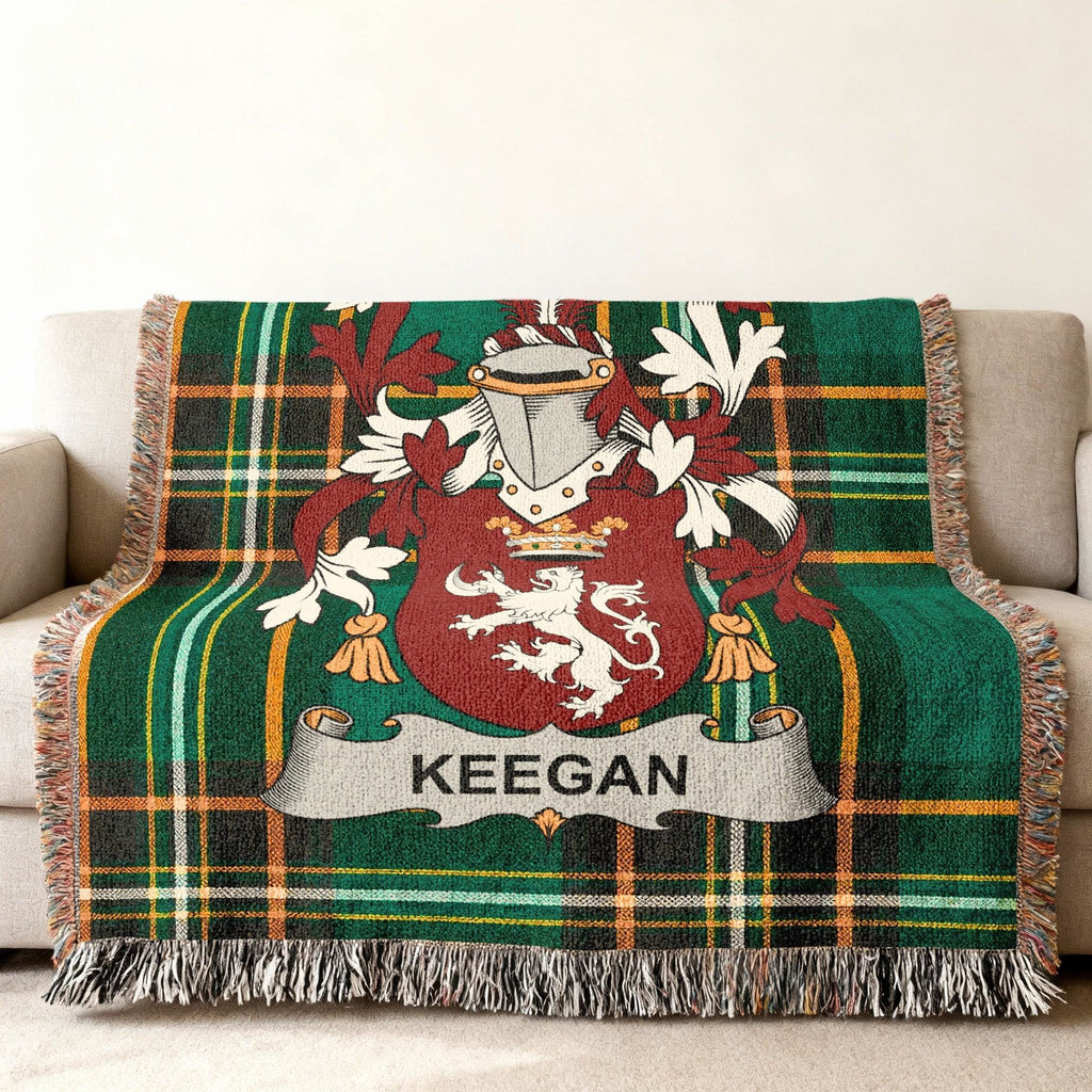Keegan family crest on a green plaid throw blanket.