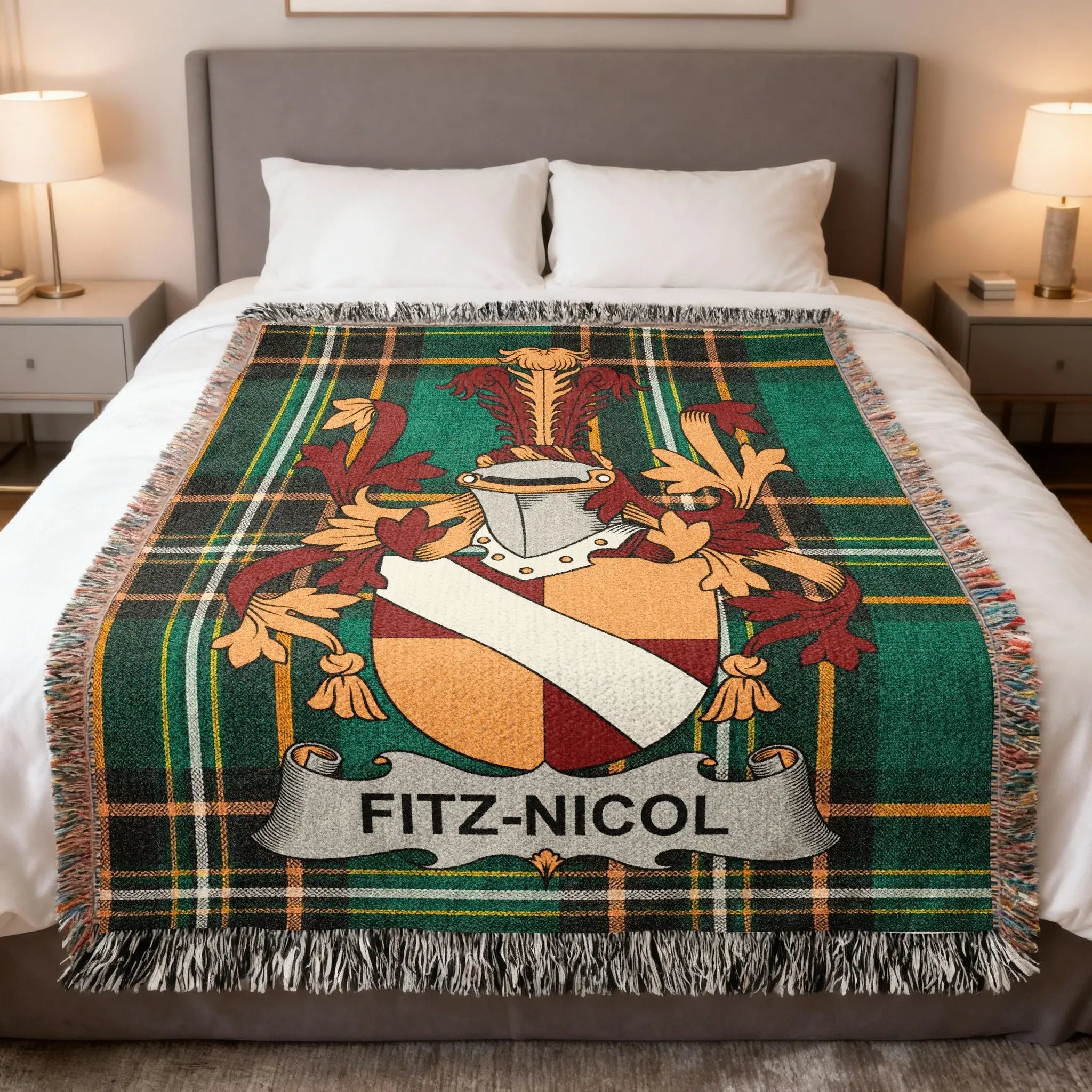 Tartan blanket featuring Fitz-Nicol coat of arms on a bed.