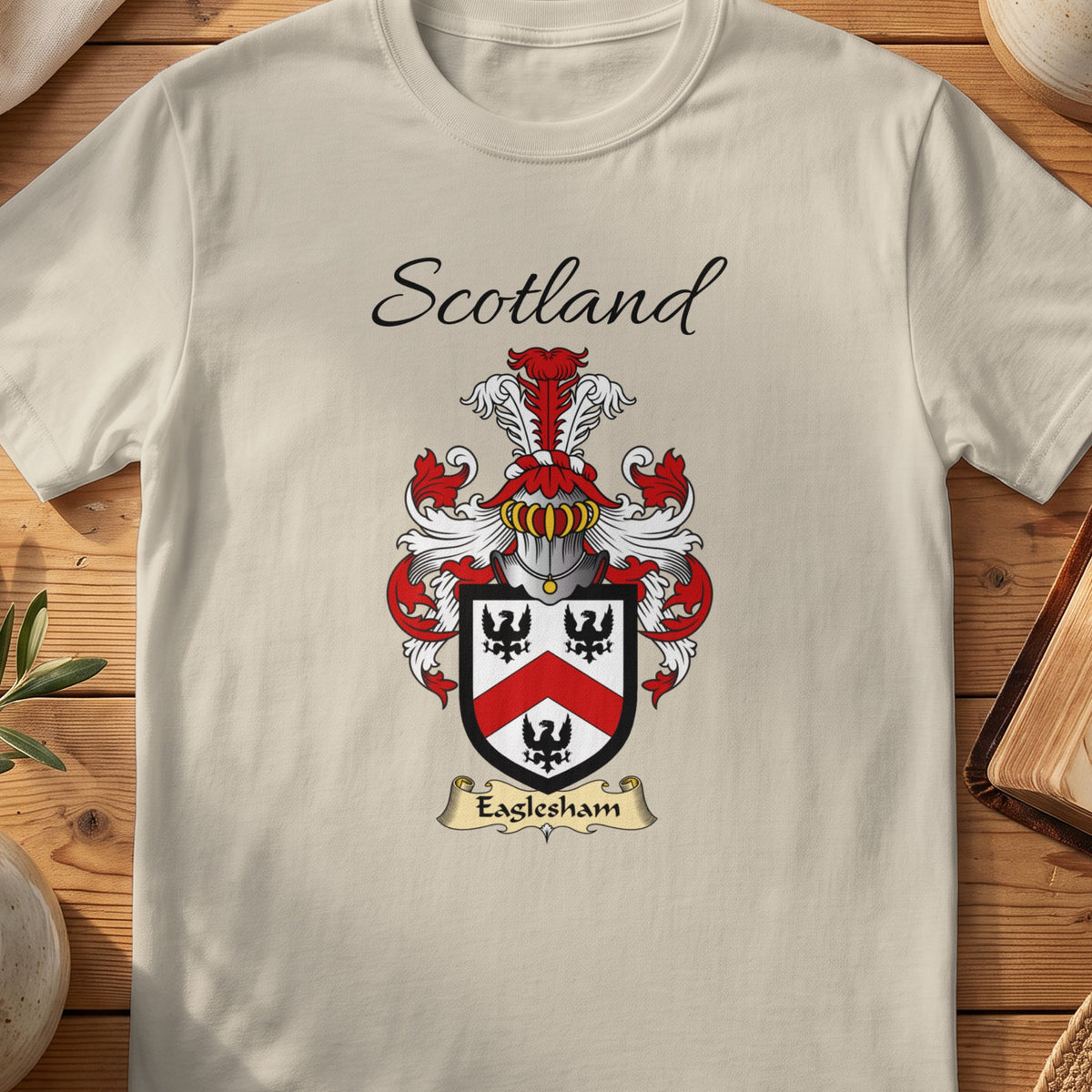Sand Eaglesham Scottish family shield T-shirt featuring black birds surrounding a red chevron