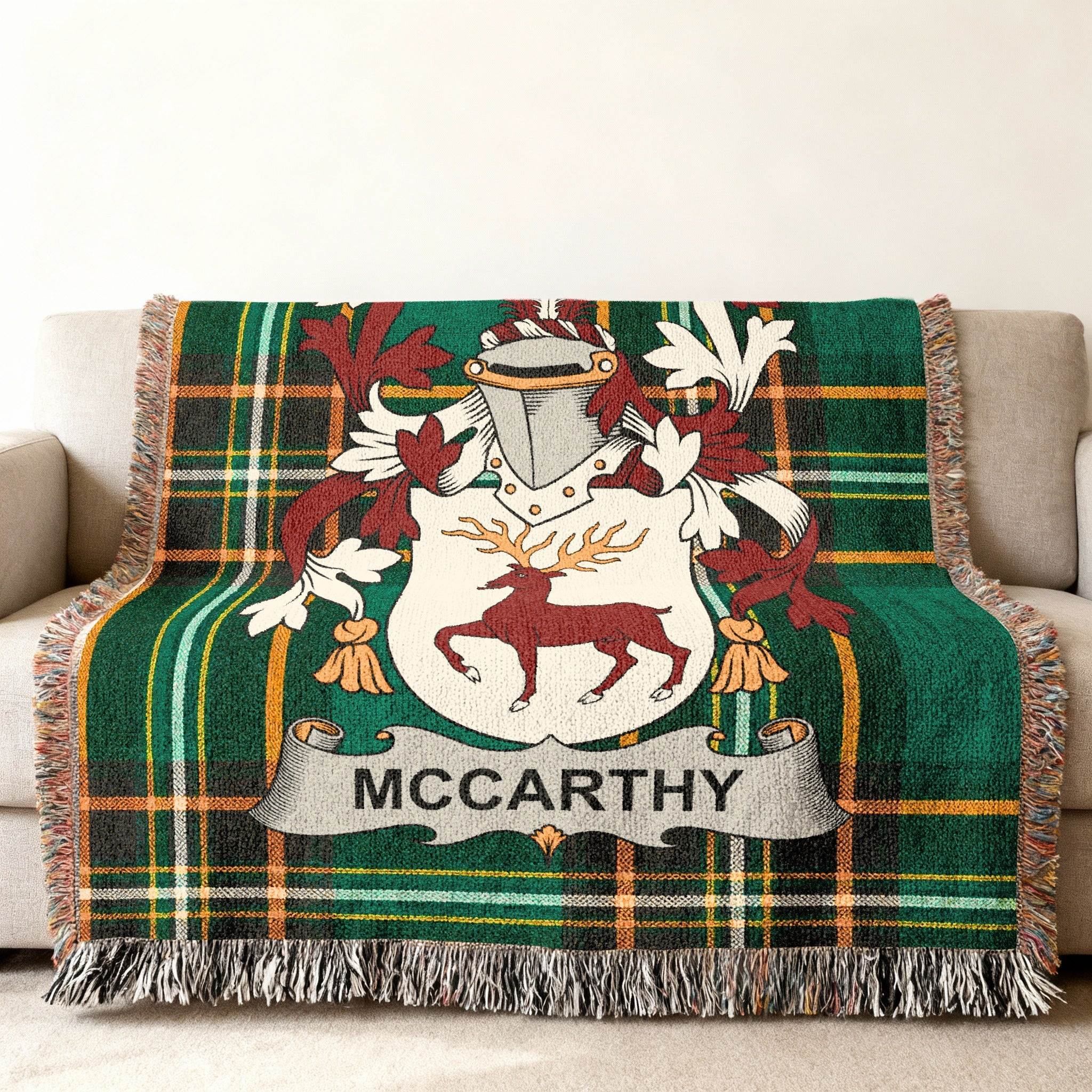 Woven throw blanket with McCARTHY surname and coat of arms on green tartan.