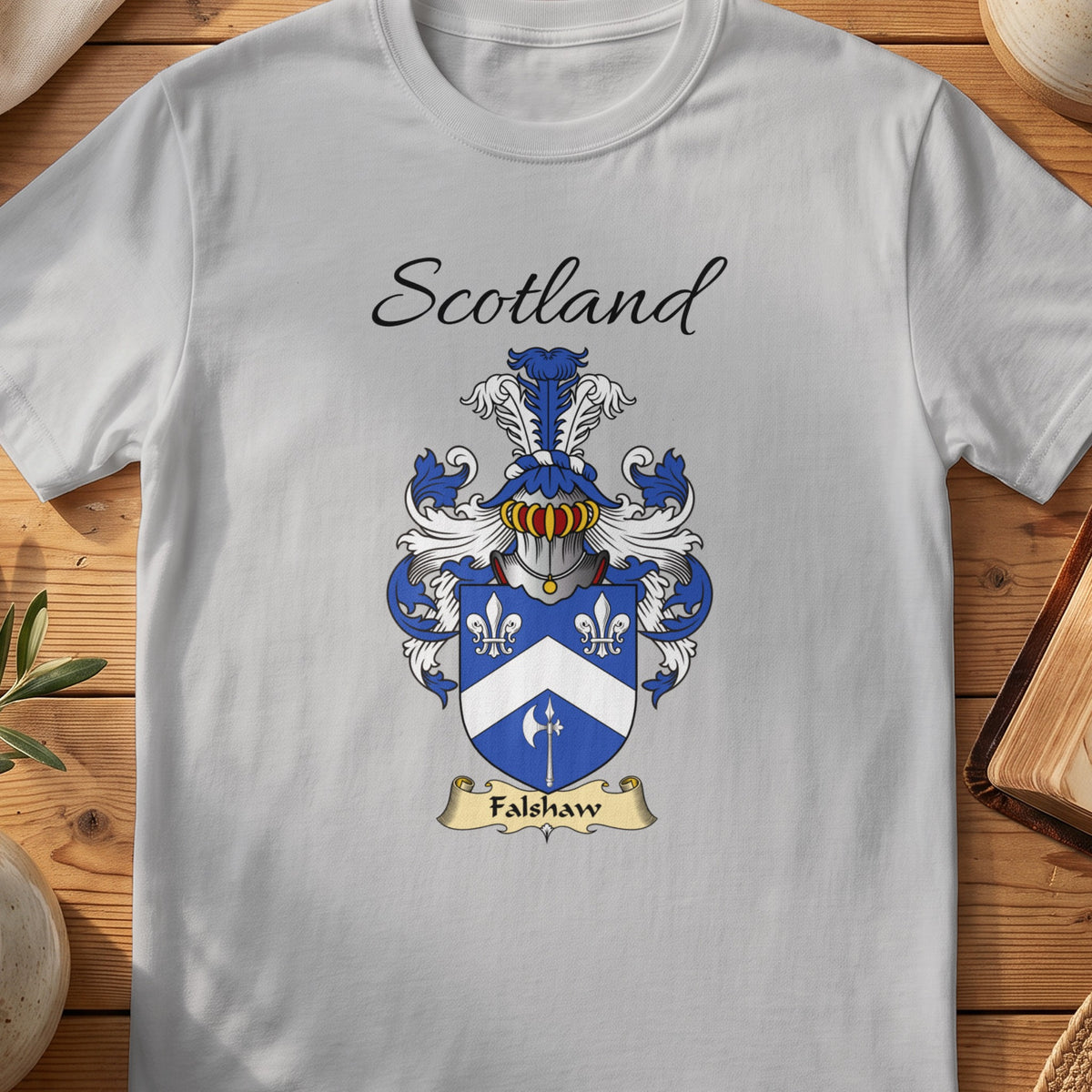 Sport Grey Falshaw Scottish family shield T-shirt featuring a white chevron and floral motifs on blue