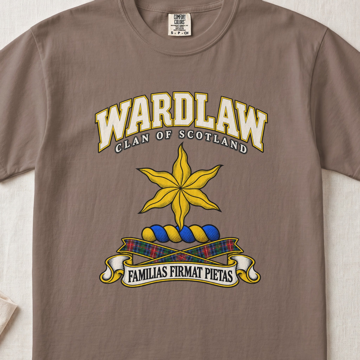 Wardlaw Scottish clan T-shirt in Espresso, front view with a golden star with wavy points and motto design.