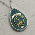 Keith clan Scottish tartan necklace with clan crest and Veritas Vincit motto on tartan background