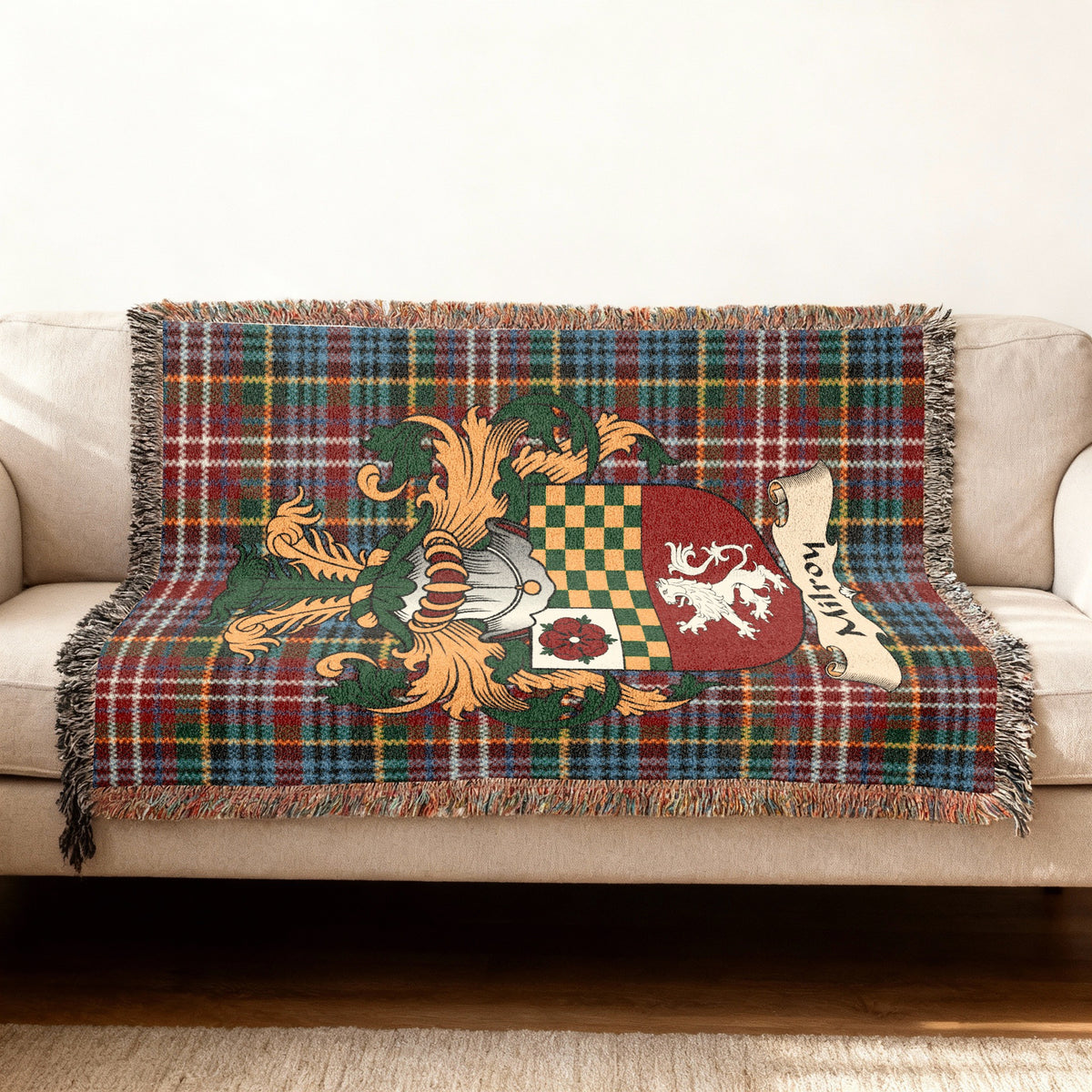 Milroy Scottish woven blanket with family shield and Caledonia tartan background