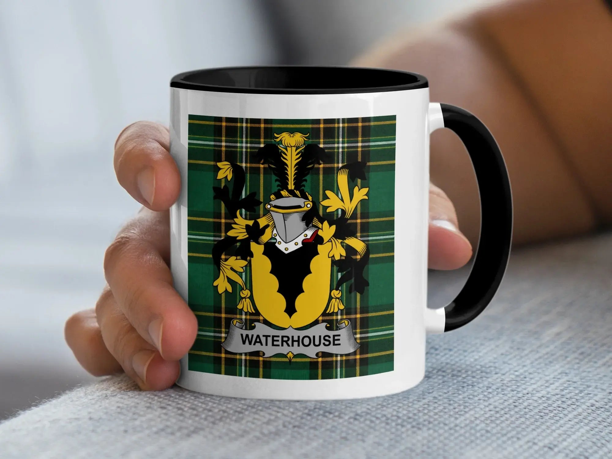 White mug with black handle featuring a Scottish tartan pattern and a coat of arms with "WATERHOUSE" text.