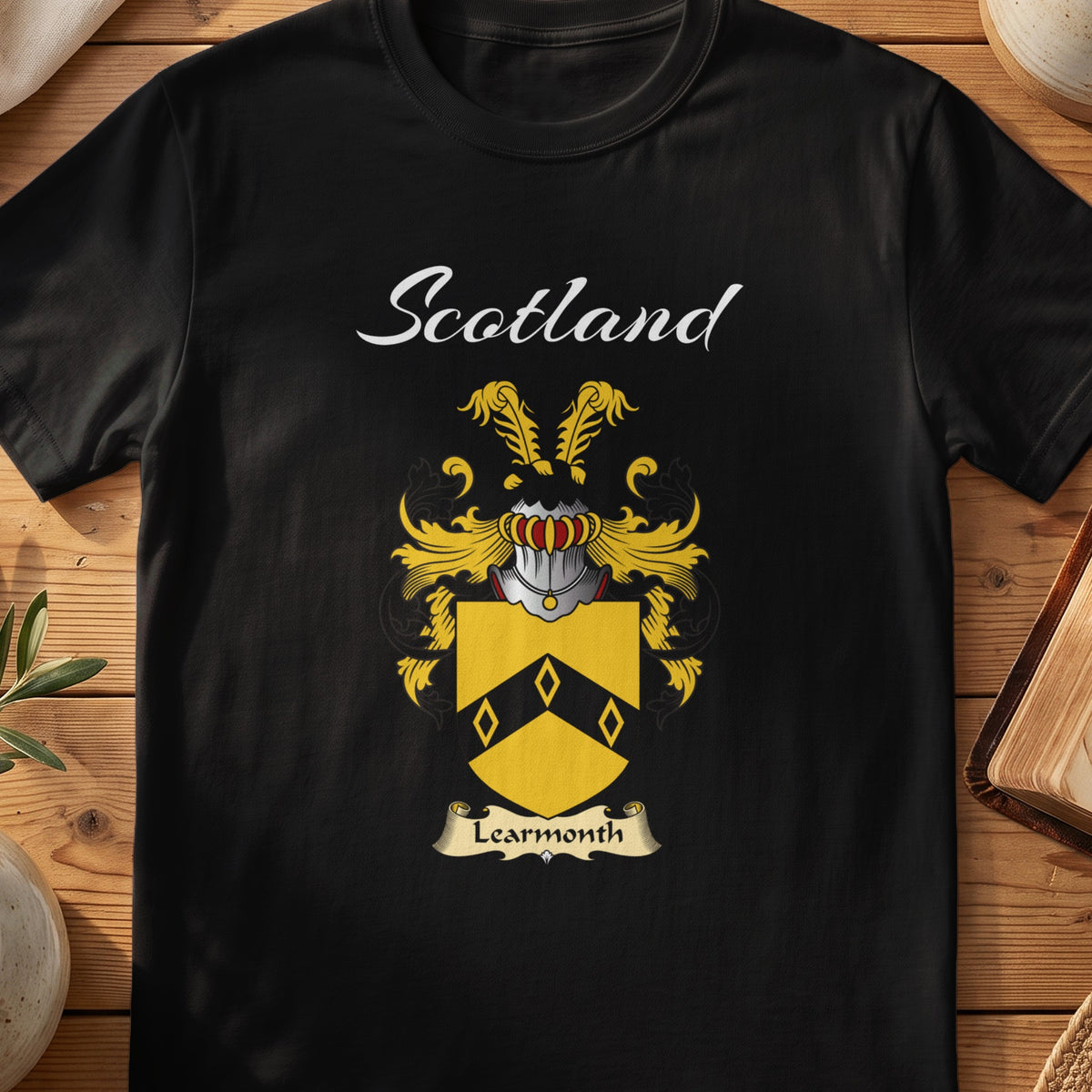Black Learmonth Scottish T-shirt featuring a black chevron with diamond details on gold