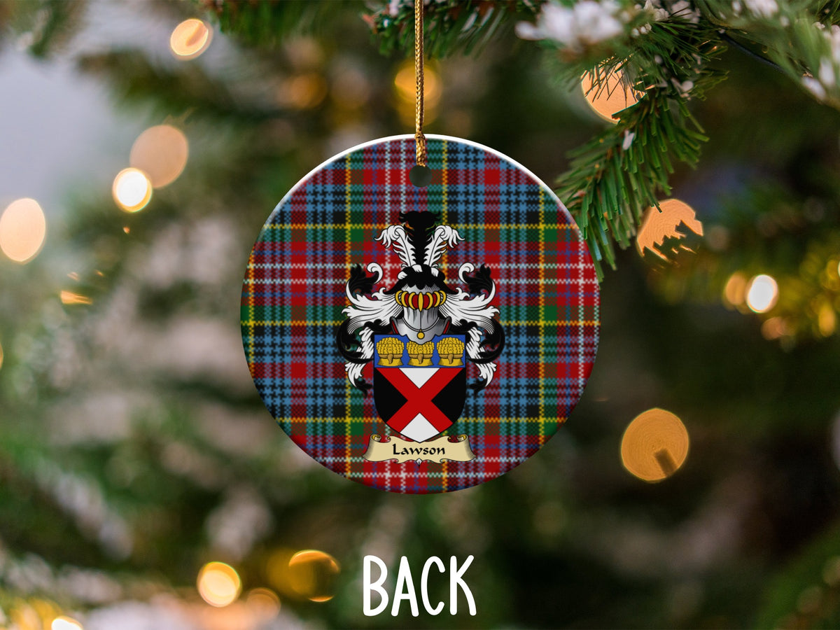 Lawson ceramic ornament detail showing a double-sided family shield on a Caledonia tartan background