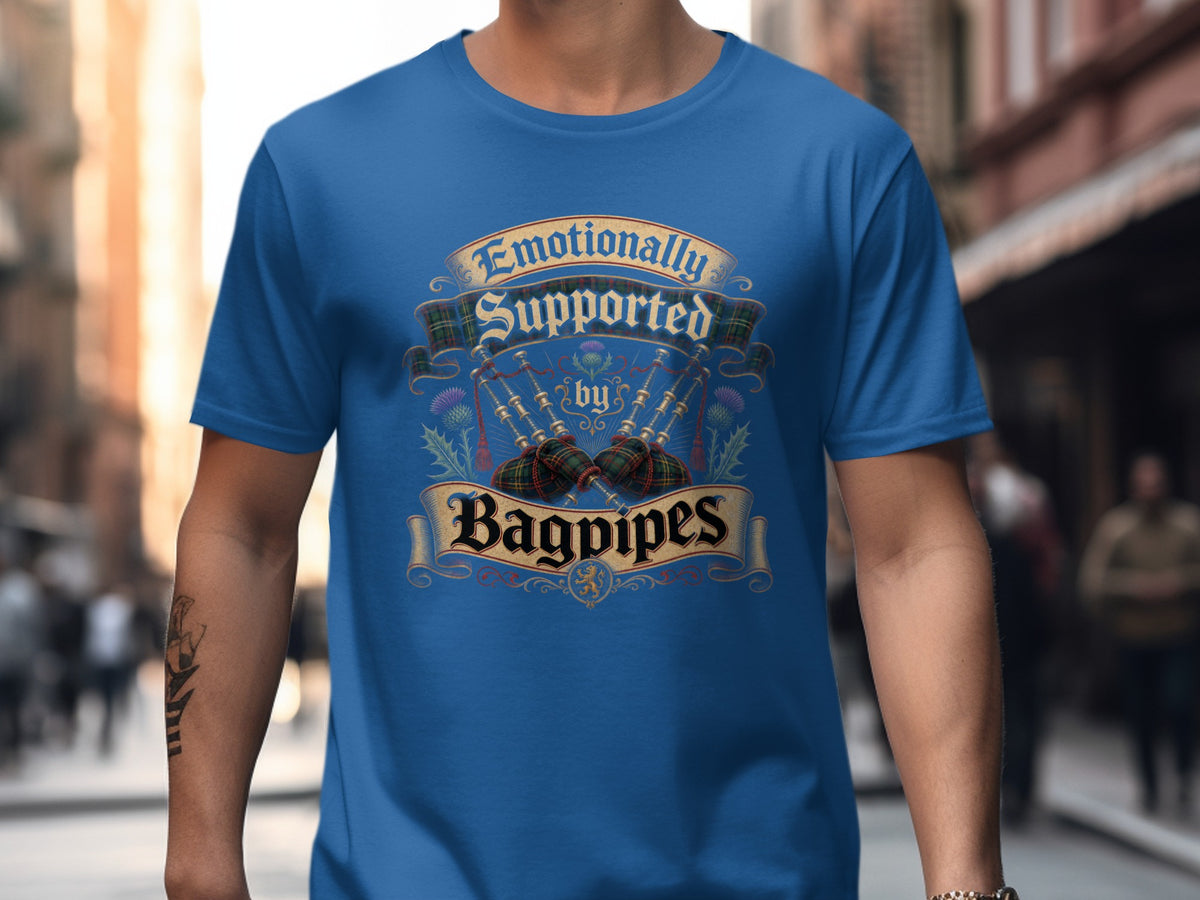 Blue t-shirt with "Emotionally Supported by Bagpipes" text and bagpipe graphics.