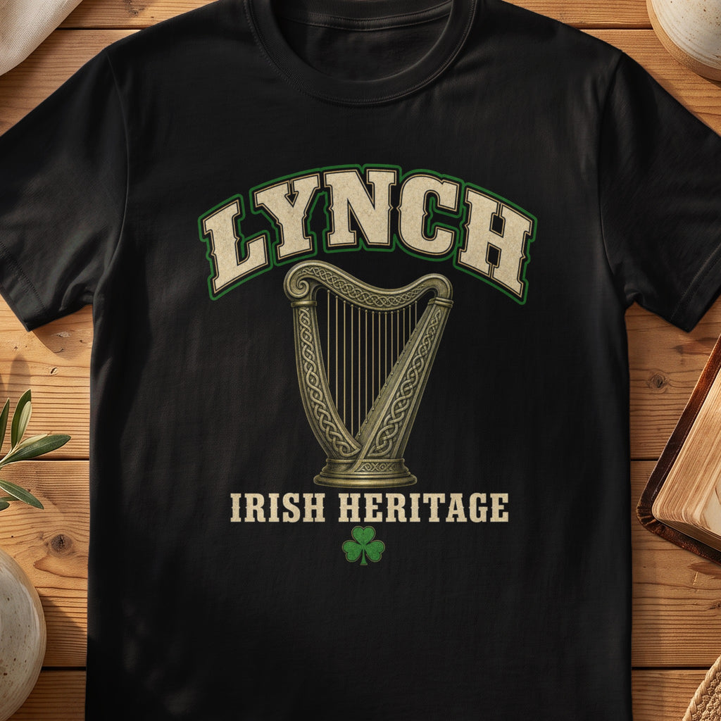 Lynch Irish harp T-shirt in Black, with cream surname lettering, a gold-toned harp, green shamrock and “Irish Heritage” text.