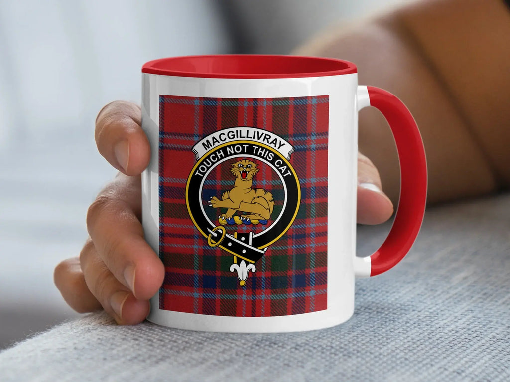 MacGillivray tartan clan crest mug in hand — showing full tartan wrap and coloured handle