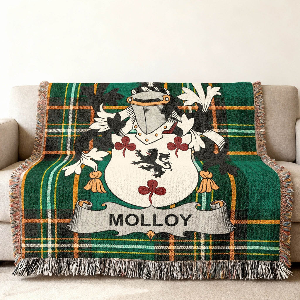 Green plaid blanket with the Molloy family crest and name.