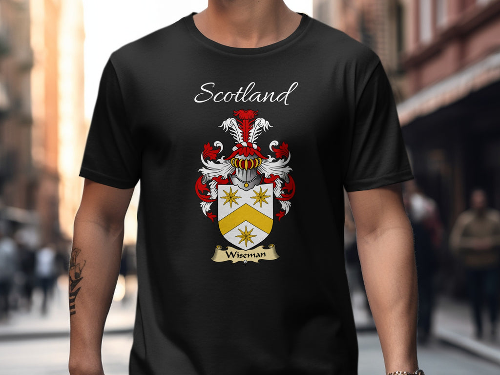 Model wearing the black Wiseman Scottish surname T-shirt with family crest artwork.
